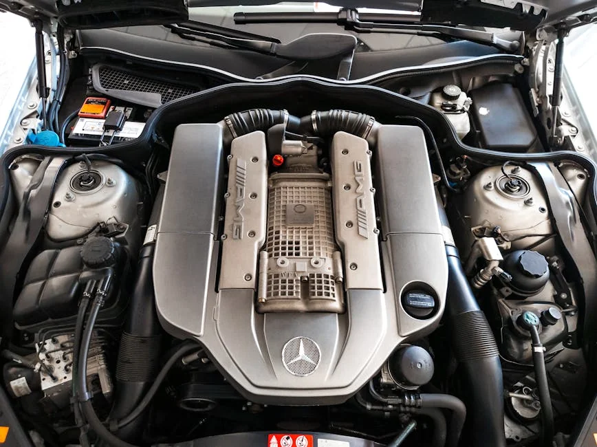 Detailed view of a high-performance car engine revealing intricate components and engineering. - benefits of cold air intake systems