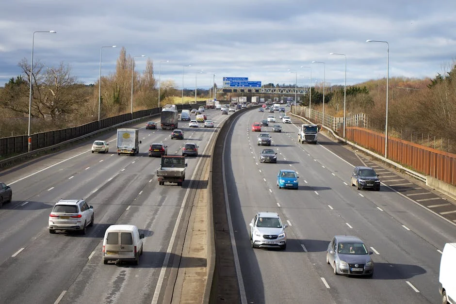 Aerial view of highway traffic in St Albans, England on a clear day. - best driving roads in the united kingdom