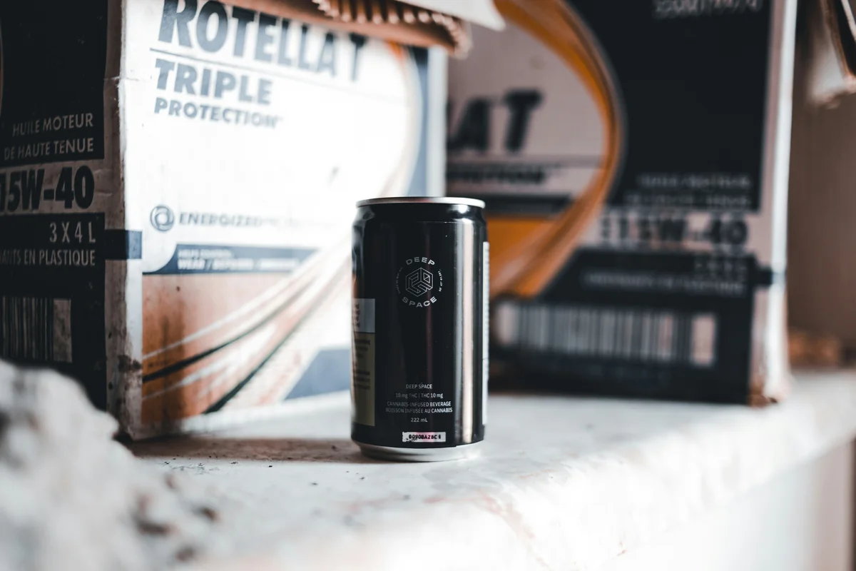 a can of beer sitting on top of a table - best synthetic oil for high mileage engines