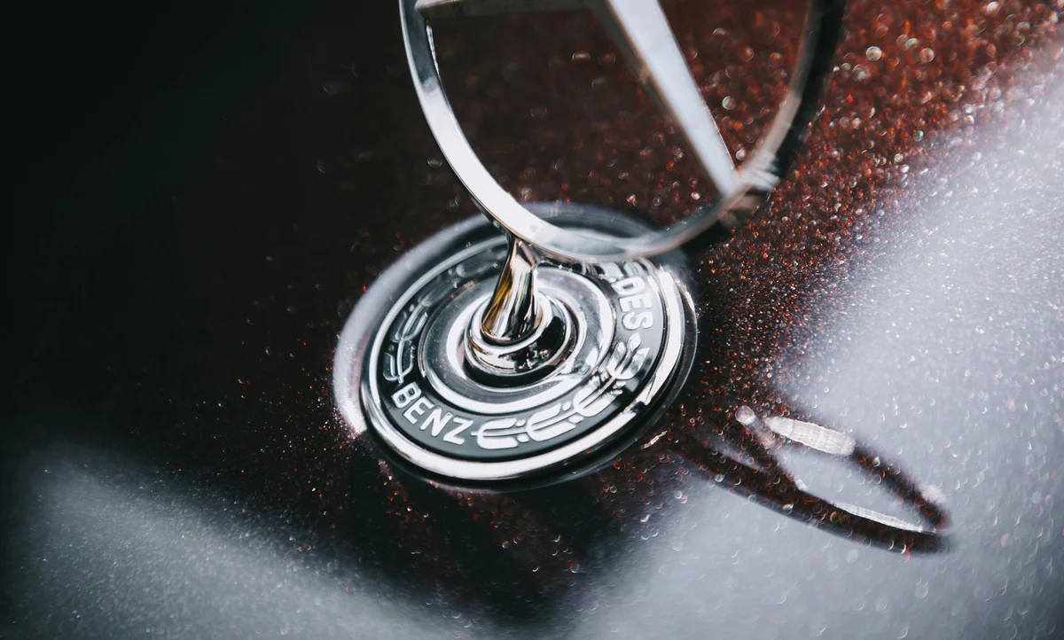 A mercedes-benz key inside the ignition. - best synthetic oil for high mileage engines