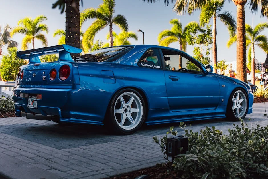 Stunning blue Nissan GT-R R34 showcased at a car event in Tampa, Florida. - underrated jdm cars under 10k